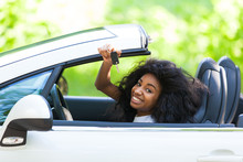 Young Black Teenage Driver Holding Car Keys Driving Her New Car