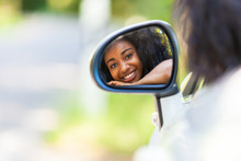 Young Black Teenage Driver Seated In Her New Convertible Car - A