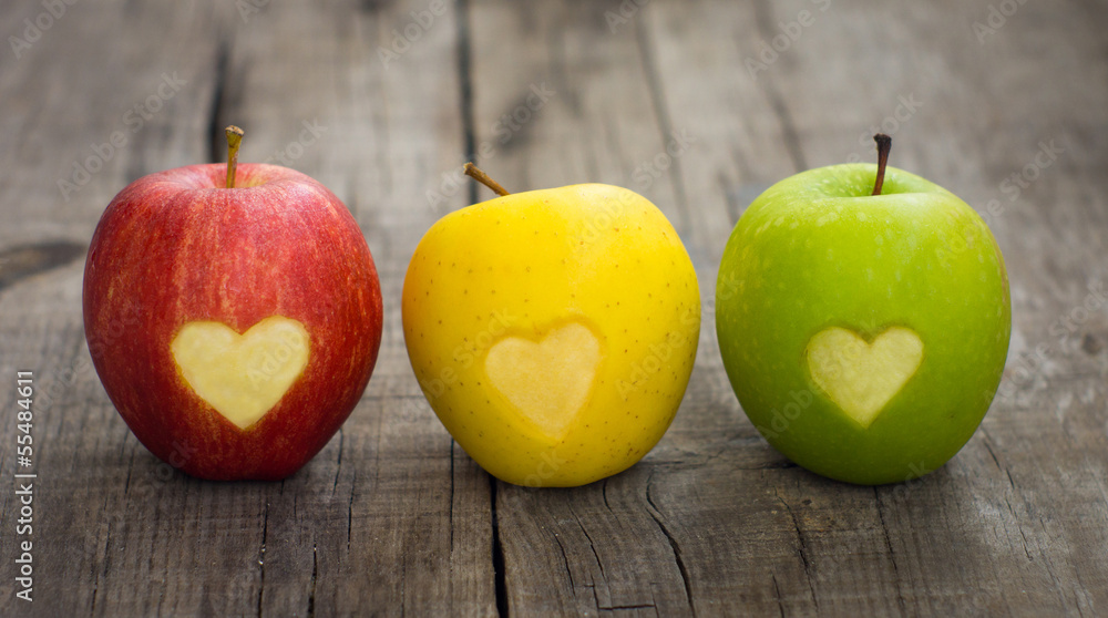 Apples with engraved hearts - obrazy, fototapety, plakaty 
