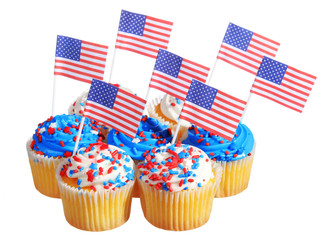 Wall Mural - Patriotic cupcakes decorated with American Flags, isolated