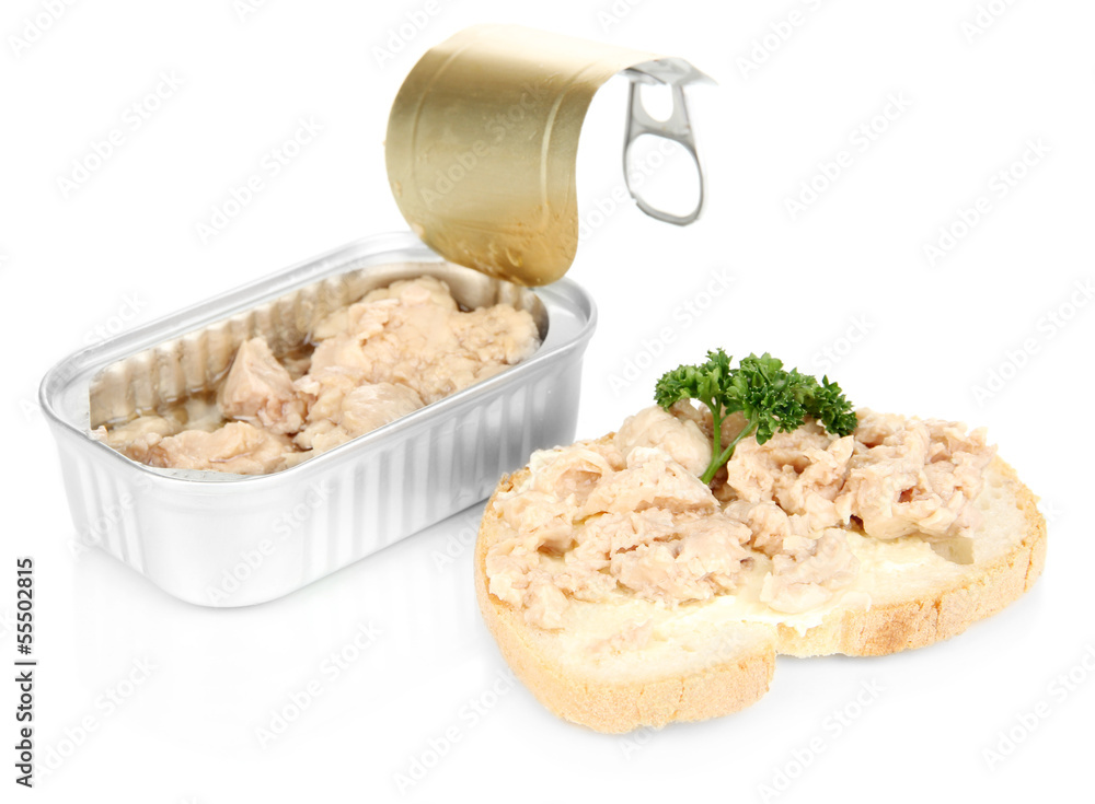 Open tin can and tasty sandwich with cod liver, isolated