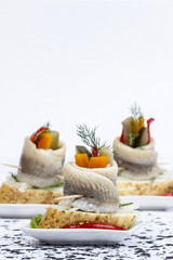 Wall Mural - Pickled herring rolls with vegetables