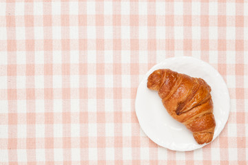 croissant on the table cloth