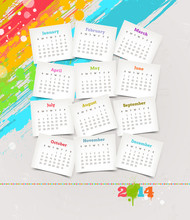 Cardboards With Calendar Of 2014 On A Colorful Background