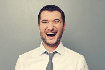 Sticker - joyful man over grey background