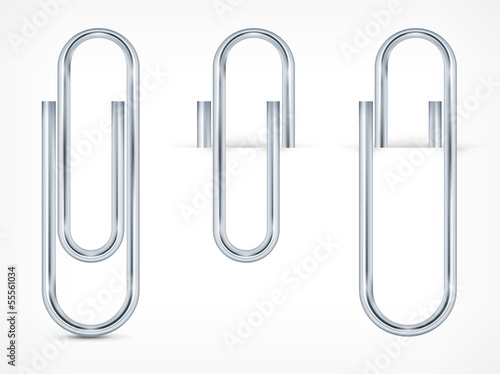 Fotografía Metallic clips on white paper sheet, vector illustration