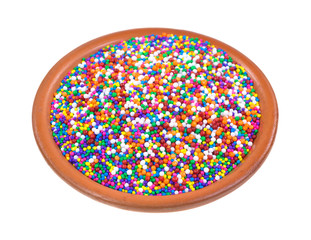 Wall Mural - Colorful candy sprinkles in bowl