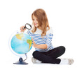© Syda Productions - child looking at globe with magnifier