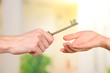 Transfer of house key, on bright background