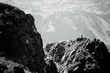 © Svetoslav Sokolov - black and white landscape wit peak in hign mountains, man above the clifts