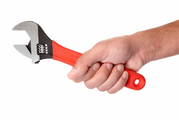 Hand of auto mechanic with wrench.