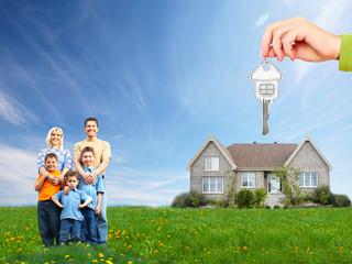 Wall Mural - Happy family near new house.