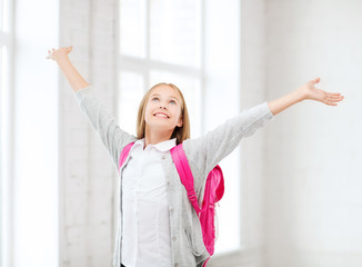 Sticker - student girl with hands up at school