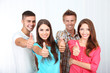 © Africa Studio - Group of happy beautiful young people at room