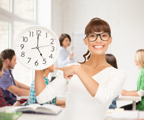 Wall Mural - student showing clock