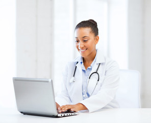 Poster - female doctor with laptop pc