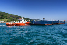 Tug Boat And Barge