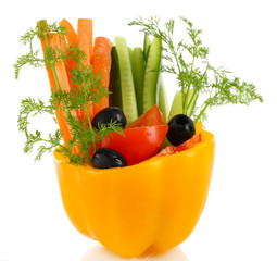 Assorted raw vegetables sticks in pepper bowl isolated on white