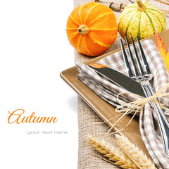 Autumn table setting with pumpkins