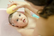 © FotoAndalucia - Black eyed baby in bathtub