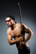 © Elnur - Man with sword and face paint
