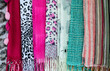 The collection of beautiful colorful scarves