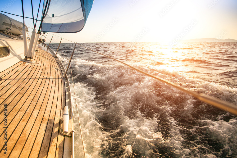 Sailing to the Sunrise. Luxury yacht. - obrazy, fototapety, plakaty 