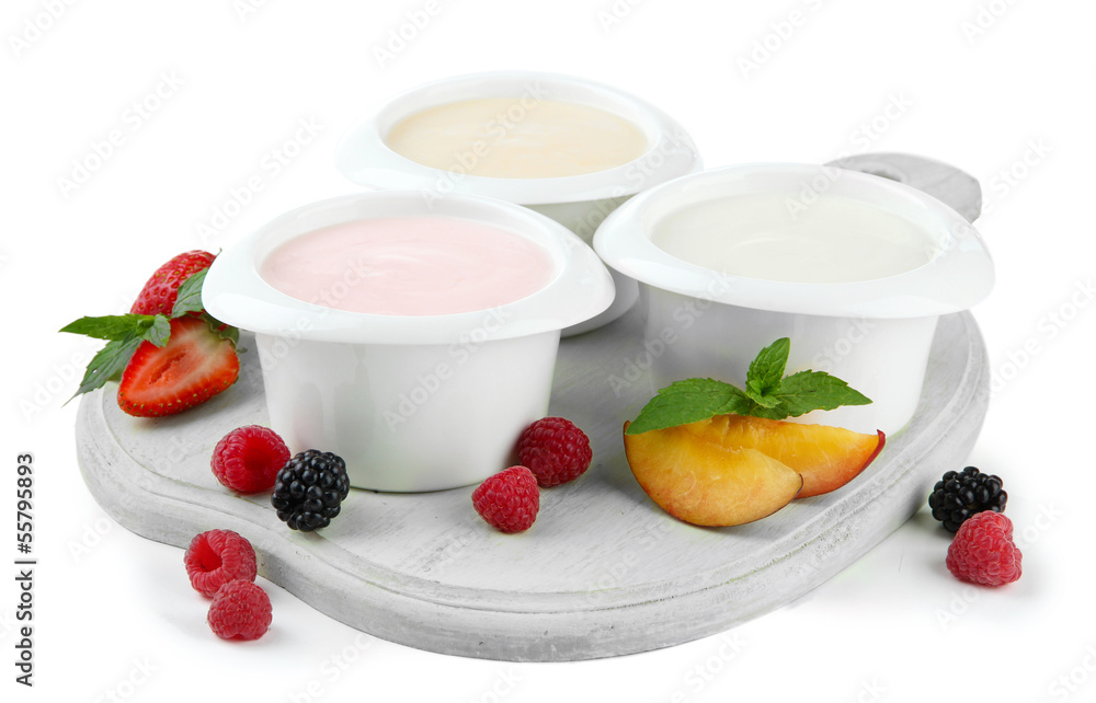 Delicious yogurt with fruit and  berries isolated on white