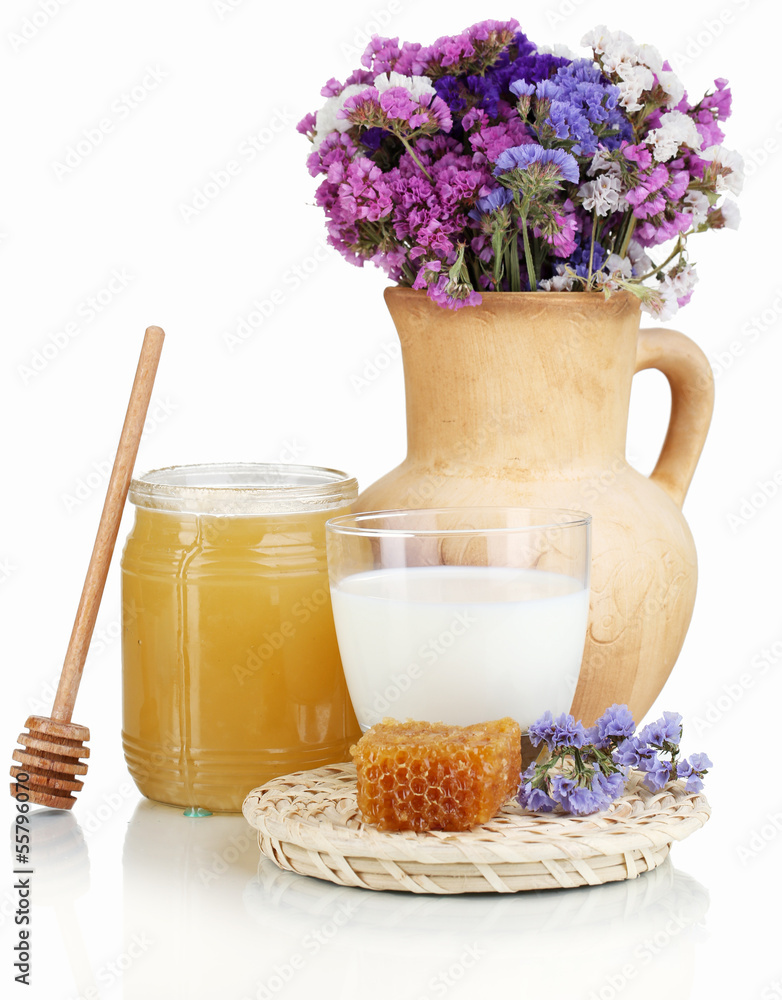 Honey and milk isolated on white