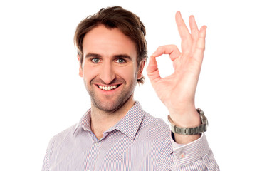 Smart man showing okay sign