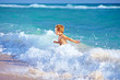 © Olesia Bilkei - cute kid boy having fun in sea surf