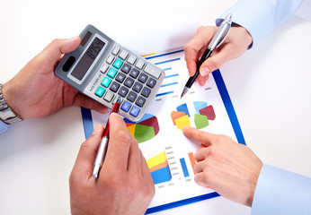 Aufkleber - Hands of business people with calculator.
