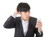 © ChenPG - Angry businessman use cellphone