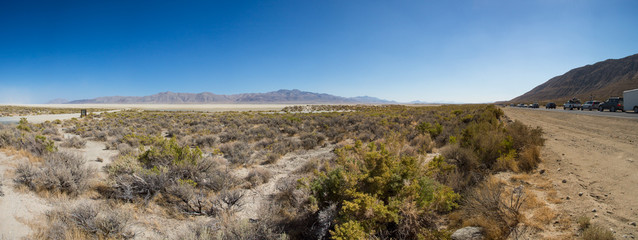 panoramic view of the traffic on the road and the black rock des