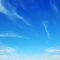 white fluffy clouds in the blue sky