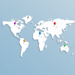 paper strategic map of the world with colorful pins