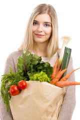 Canvas Print - Beautiful woman carrying vegetables