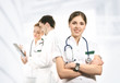 © Acronym - A team of young and smart medical workers in white clothes