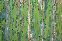 Green And Blue Peeling Paint Old Fence.