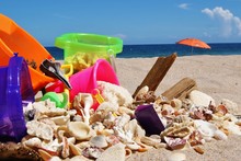 Shells And Sand Buckets With Umbrella In Florida
