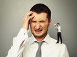 © ArtFamily - small man screaming at big man
