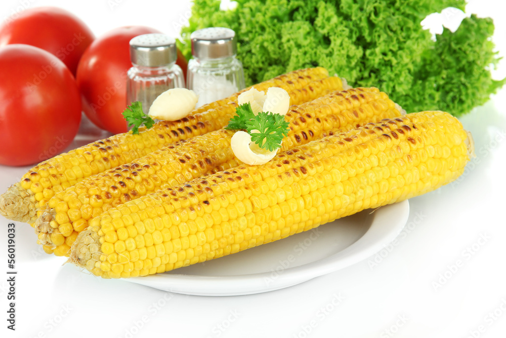 Delicious golden grilled corn with butter isolated on white