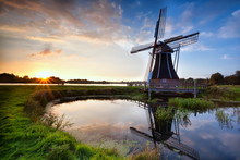 Charming Dutch Windmill At Sunset