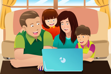 Poster - Happy family looking at a laptop