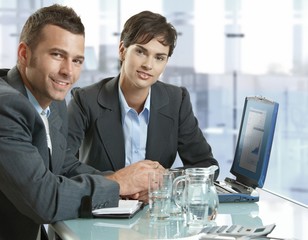 Wall Mural - Business people working at meeting table