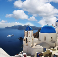 Santorini with churches and sea view in Greece