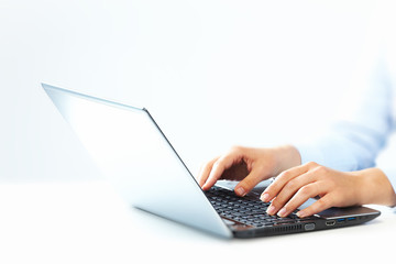 Aufkleber - Hands with laptop computer keyboard.