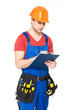 worker with tools, planning and writing the note