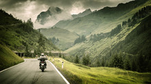 Motorcyclist On Mountainous Highway