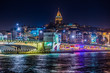 View of Istanbul and Galata tower and bridge at night